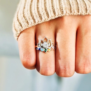 Elegant S925 silver lotus crown ring with colorful cubic zirconia worn on a finger