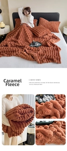 Detailed texture of caramel rabbit fur plush blanket with carved stripe pattern bedding