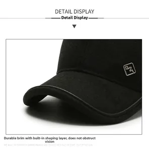 Detail of sturdy baseball cap brim with built-in interlayer for shape and metal logo