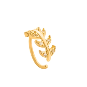 Macro detail of leaf-shaped nose ring with gold plating and sparkling zircon stones