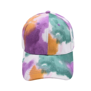 Detail of tie-dye baseball cap featuring purple and green abstract patterns on white