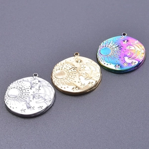Detailed view of sun moon and stars charms in silver gold and rainbow stainless steel