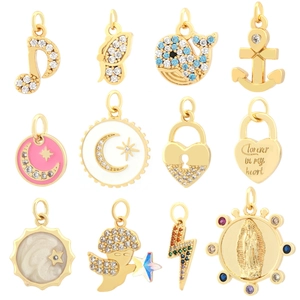Set of 12 gold-plated enamel pendants with heart, moon, and star designs for jewelry making