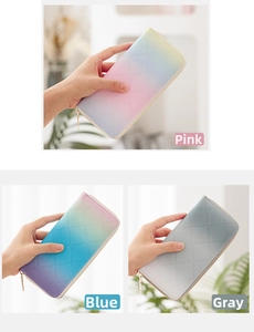 Three long quilted zip wallets in gradient pink, blue, and grey stylish color options