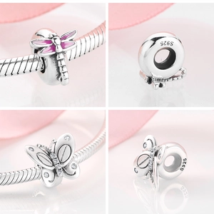 Detail of S925 sterling silver charms featuring pink enamel dragonfly and butterfly