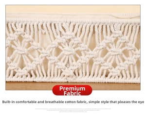 Detail of woven cotton storage basket showing geometric patterns and white fabric lining