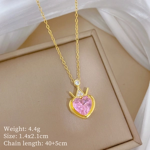 Detailed view of pink heart crown necklace in box with weight and size specifications