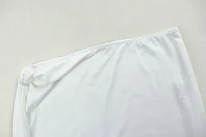 Close-up detail of fine stitching and smooth hem on white slim fit knitted skirt set
