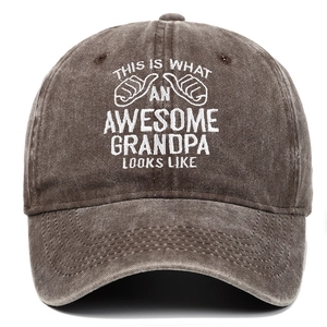 Close-up of vintage washed cotton baseball cap with white Grandpa embroidery and thumb icons