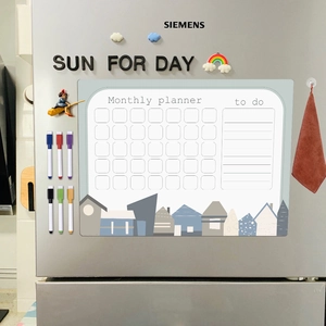 Magnetic monthly planner on fridge with six colorful whiteboard markers and to-do list