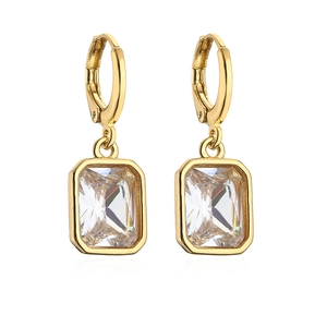 Detail of 18K gold-plated earrings featuring emerald-cut baguette cubic zirconia stones