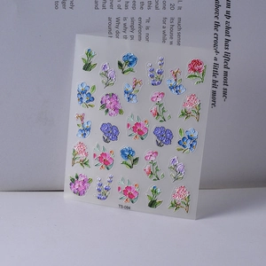 Detail of TS-084 5D floral nail stickers featuring colorful roses and embossed texture