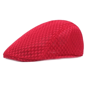 Detail of red mesh beret featuring breathable lace-up hollow weave for summer