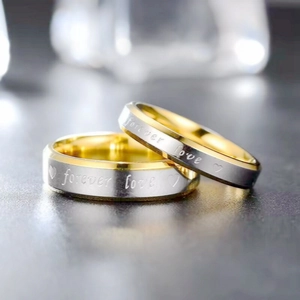 Polished titanium steel couple rings with Forever Love engraving and heart symbol