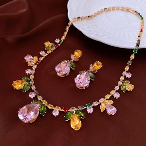 Luxury zircon flower jewelry set featuring pink and yellow crystals with gold plating