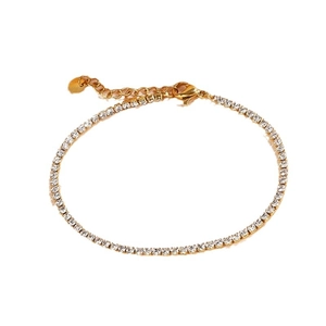 Elegant adjustable gold stainless steel tennis bracelet featuring white cubic zirconia stones