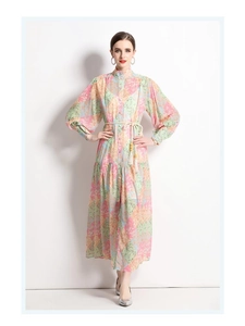 Detail of vintage floral print maxi dress with tassel waist tie and stand collar design