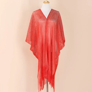 Elegant red V-neck shawl for women with fringe hem and shimmering knitted fabric on mannequin