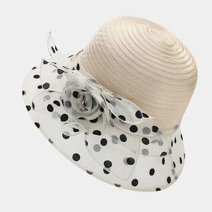 Detailed view of women's organza sun hat with mesh flower and pearl embellishment