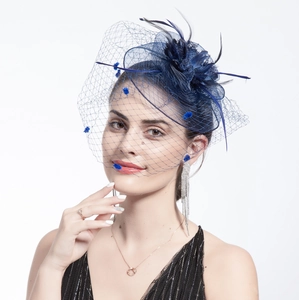 Close-up of navy blue feather veil headpiece with elegant floral mesh details
