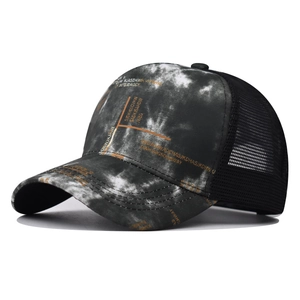 Tie-dye baseball cap with black and white gradient, orange print, and mesh back