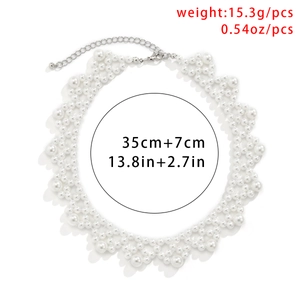 Detailed view of layered white pearl choker necklace with adjustable lobster clasp