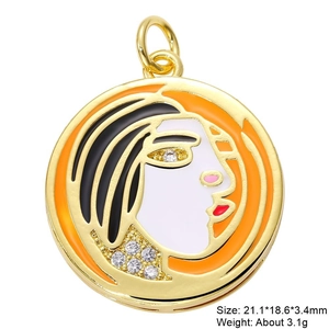 Detailed macro view of gold-plated portrait pendant with colorful enamel and zircon stones