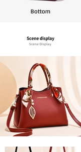 Detail of red bridal tote bag with silk scarf handle and golden leaf pendant charm