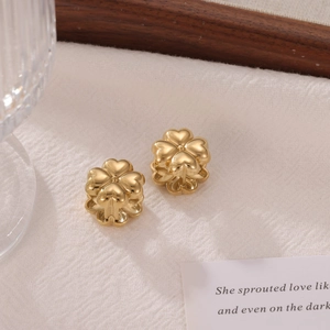 Elegant gold clover earrings in titanium steel with a polished vintage finish