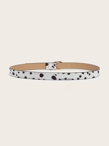 Detailed view of women's leopard cow print belt with faux horsehair texture and gold buckle