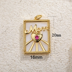 Detail showing a 20x16mm gold Mama heart pendant with pink gemstone and white inlay