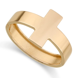 Detailed view of the polished gold cross bangle showing the adjustable open cuff design