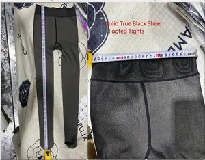 Macro detail of measurement for thermal black translucent footed leggings with fleece lining