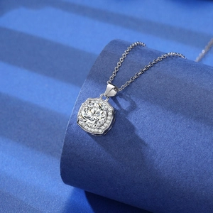 Detail of 2-carat zircon pendant with hexagonal setting and white gold plating