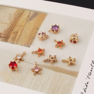 Gold plated pendants with colorful zircon in star, crown, and snowflake shapes for DIY jewelry