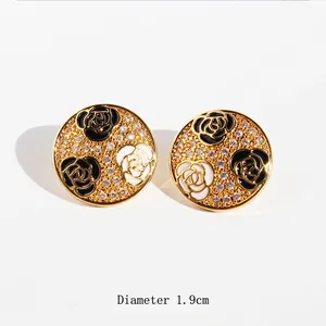 French vintage camellia flower earrings with black and white enamel and zircons, 1.9cm diameter