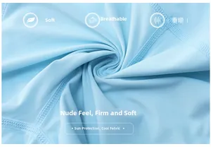 Detail of light blue athletic fabric showing smooth stitching and breathable texture