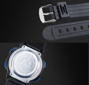 Detail of waterproof digital watch showing stainless steel buckle and engraved case back