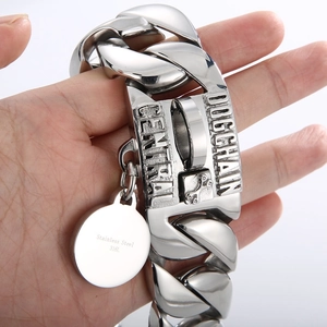 Close-up of 316L stainless steel Cuban dog collar with engraved bone buckle and logo