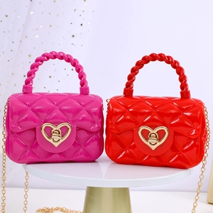 Quilted jelly mini handbags with heart lock and twist handle in red and rose pink