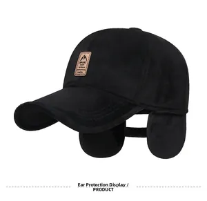 Detail view of winter baseball cap with earflaps and Sport leather badge in black