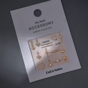 K9 mini diamond nail art stickers set with hollow gold heart shapes and adhesive backing