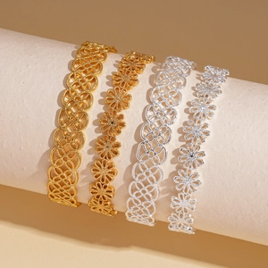 Minimalist open bangle set with hollow clover and geometric patterns in gold and silver