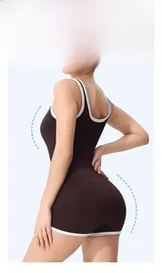 Detail showing the white trim contrast on black high-stretch compression yoga bodysuit