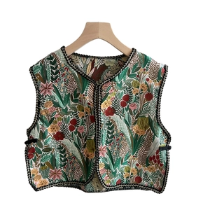 Ethnic style embroidered vest with floral patterns and black braided V-neck trim