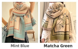 Detail of floral cashmere scarves in mint blue and matcha green with tassel fringe