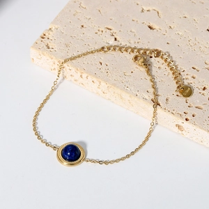 French vintage 14K gold plated stainless steel bracelet with blue gemstone on stone base
