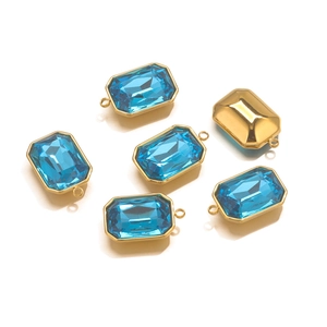 Blue topaz rectangle pendant in gold-plated stainless steel shown from multiple angles
