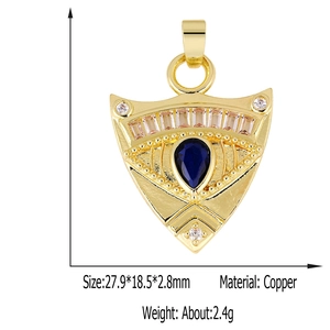 Gold shield pendant with blue teardrop stone and zircon details, 27.9x18.5x2.8mm size