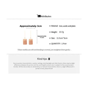 Detailed specs of long square acetate drop earrings in pink marble with silver needles